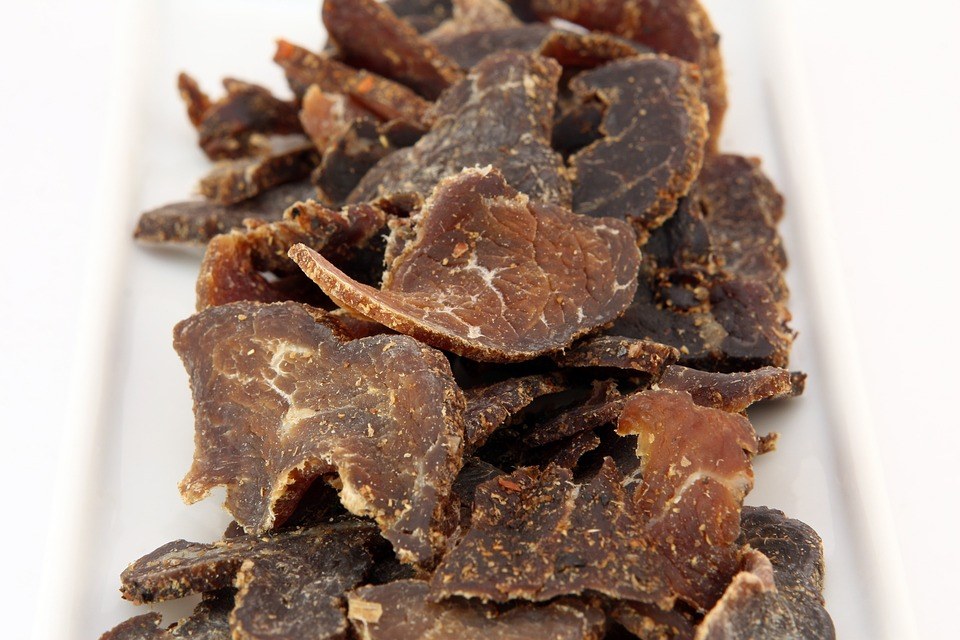 An image of thinly sliced biltong in a white dish